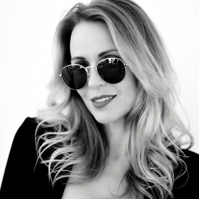 Blonde woman wearing sunglasses