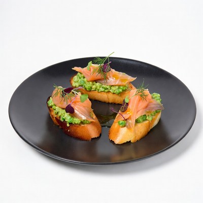 Salmon Avocado Toasts on Black Plate