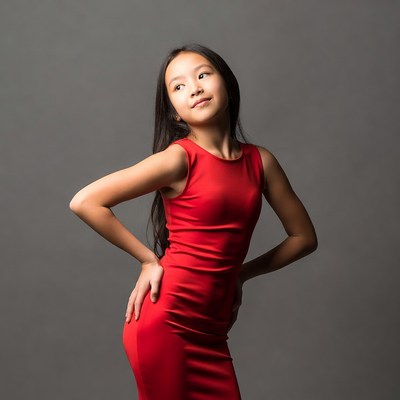 Asian girl in red dress posing
