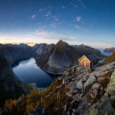 Wooden Cabin Overlooking Norwegian Fjord