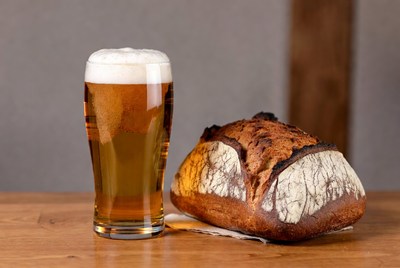 Beer Glass and Fresh Bread Loaf