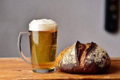 Beer mug and rustic bread loaf