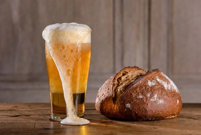 Beer Glass with Fresh Bread Loaf