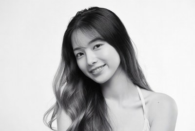 Smiling Asian woman with long hair