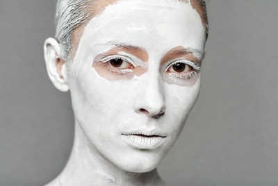 Woman with white face paint