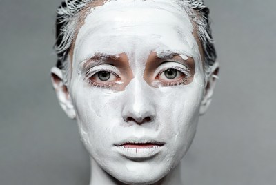 Woman with white face paint