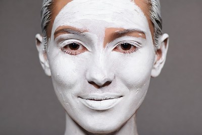 Woman with white face mask