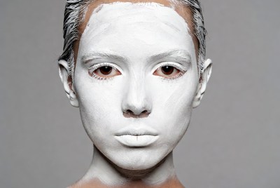 Woman with white face paint