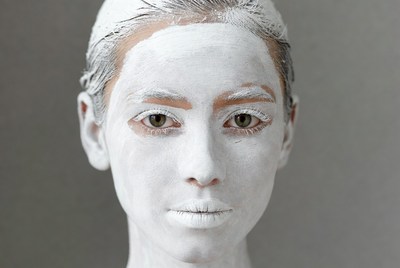 Woman with white face paint