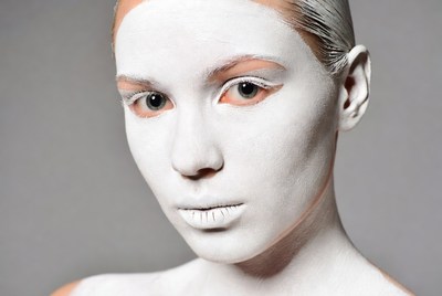 Woman with white face paint
