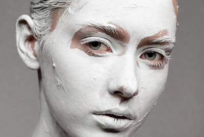 Woman with white face paint