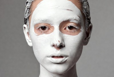 Woman with white face mask