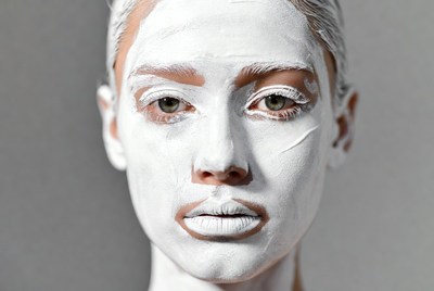 Woman with white face mask