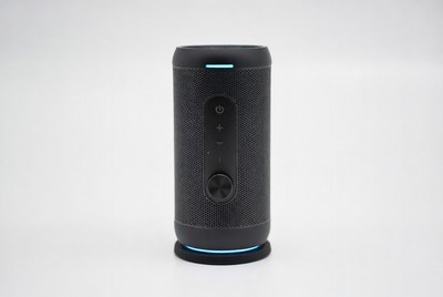 Black Bluetooth speaker with blue lights