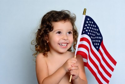 Girl holding American flag