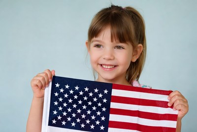 Girl holding American flag