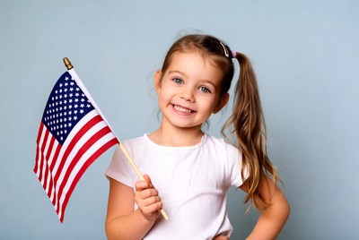 Girl holding American flag