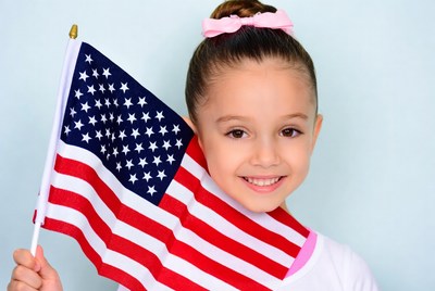Girl holding American flag