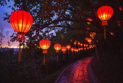 Red lanterns hanging over pathway