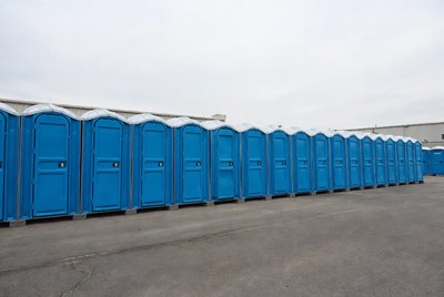 Row of Blue Portable Toilets