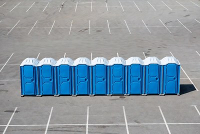 Row of Blue Portable Toilets