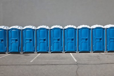 Row of Blue Portable Toilets