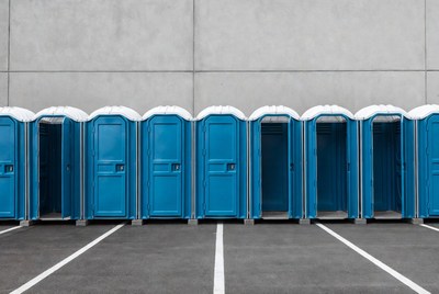 Row of Blue Portable Toilets