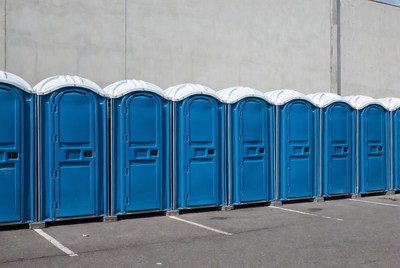 Row of Blue Portable Toilets