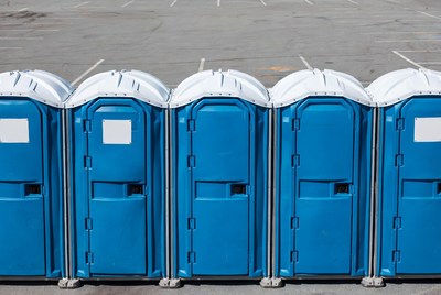 Row of Blue Portable Toilets