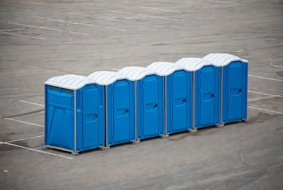 Row of Blue Portable Toilets