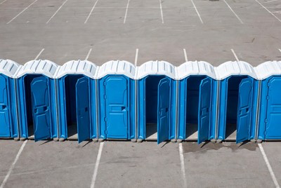 Row of Blue Portable Toilets