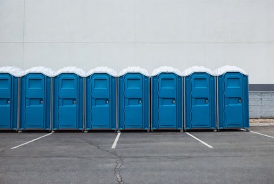 Row of Blue Portable Toilets