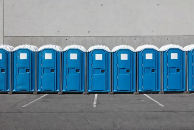 Row of Blue Portable Toilets