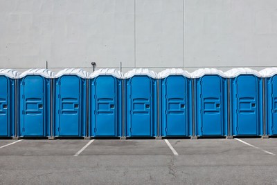 Row of Blue Portable Toilets