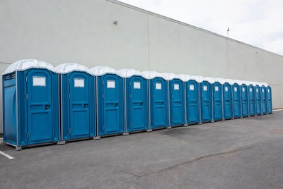 Row of Blue Portable Toilets