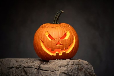 Lit Jack-o-Lantern on Rock