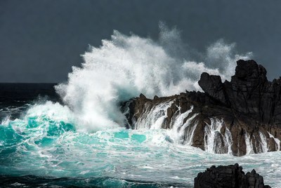 Massive Wave Crashing on Rocks