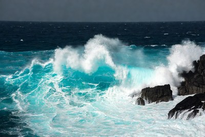 Crashing Waves on Volcanic Rocks