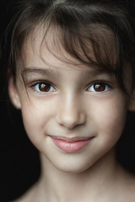 Young girl smiling close-up