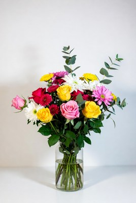 Colorful bouquet in glass vase