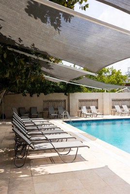 Empty Lounge Chairs Poolside