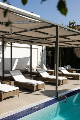White Lounge Chairs by Pool