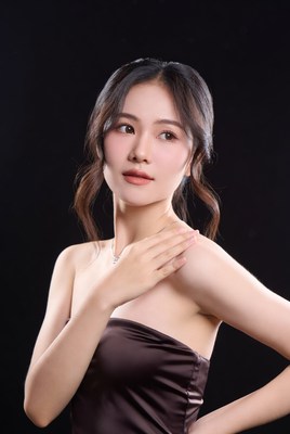 Asian woman in maroon dress