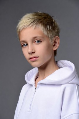 Blonde boy in white hoodie