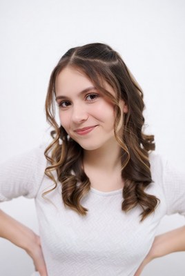 Smiling young woman with curly hair