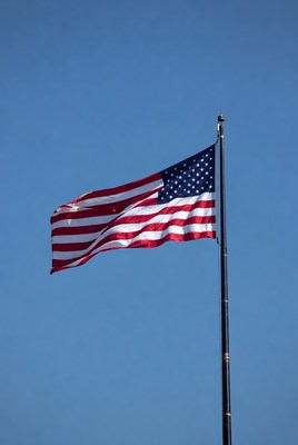 American Flag Waving on Pole