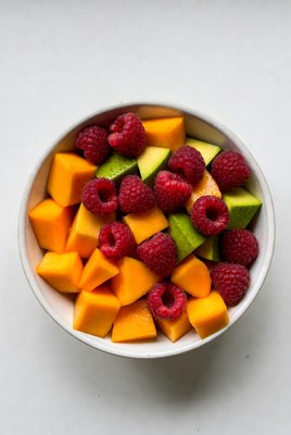 Raspberries and Mango in White Bowl