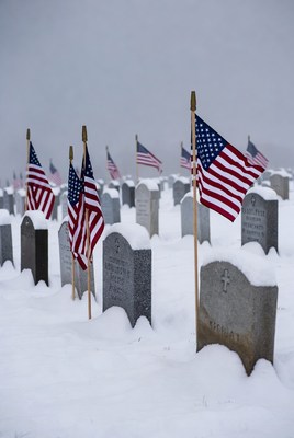 American Flags on Snowy Graves
