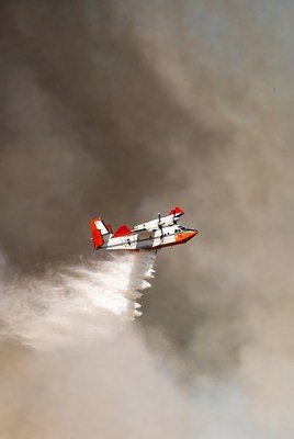 Firefighting Seaplane Dropping Water