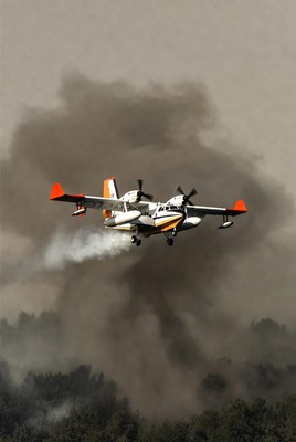 Firefighting Seaplane Dropping Water